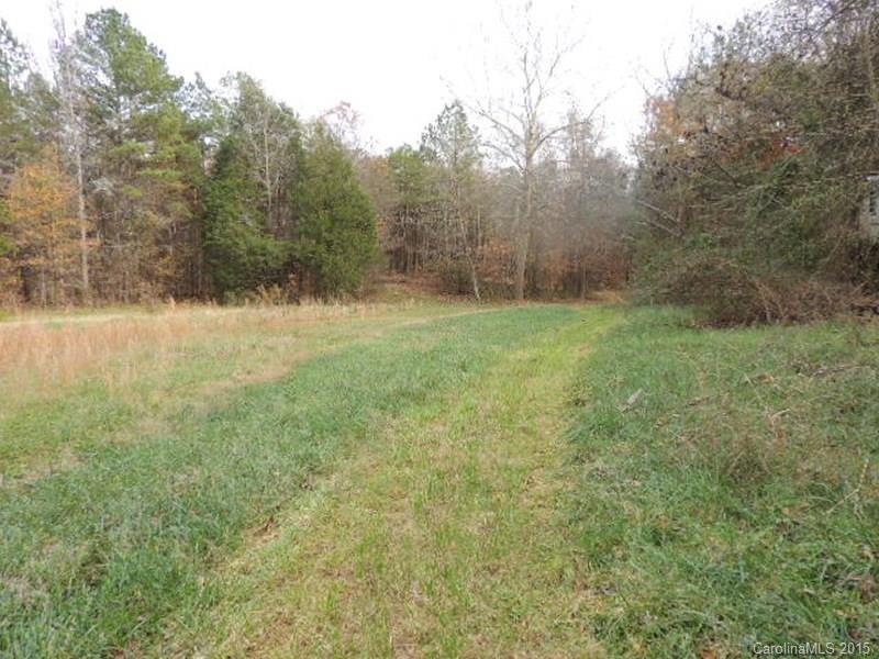 150 Alvin Hough Road Midland, NC 28107 - Photo 4 of 5 a view of a yard with a tree