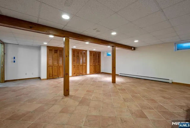 a view of outdoor space with deck and garden