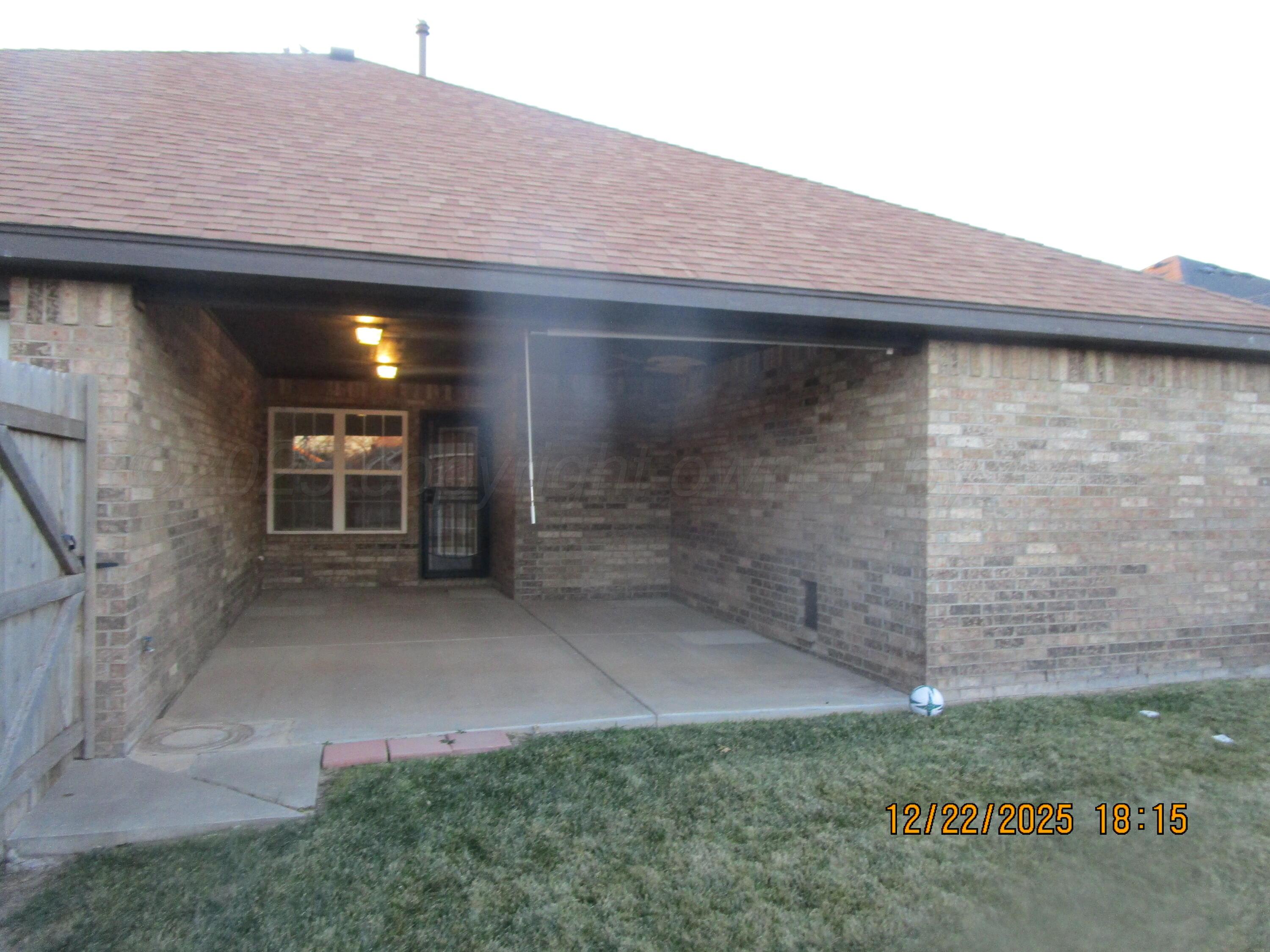 6501 Nancy Ellen Street Amarillo, TX 79119 - Photo 20 of 21 a backyard of a house