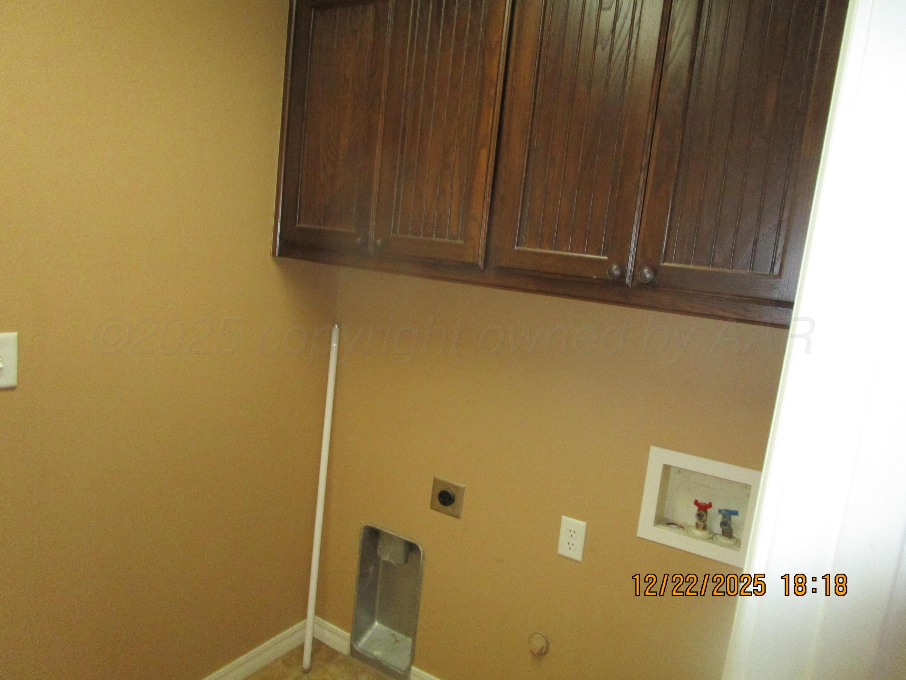 6501 Nancy Ellen Street Amarillo, TX 79119 - Photo 9 of 21 a view of a door and chair