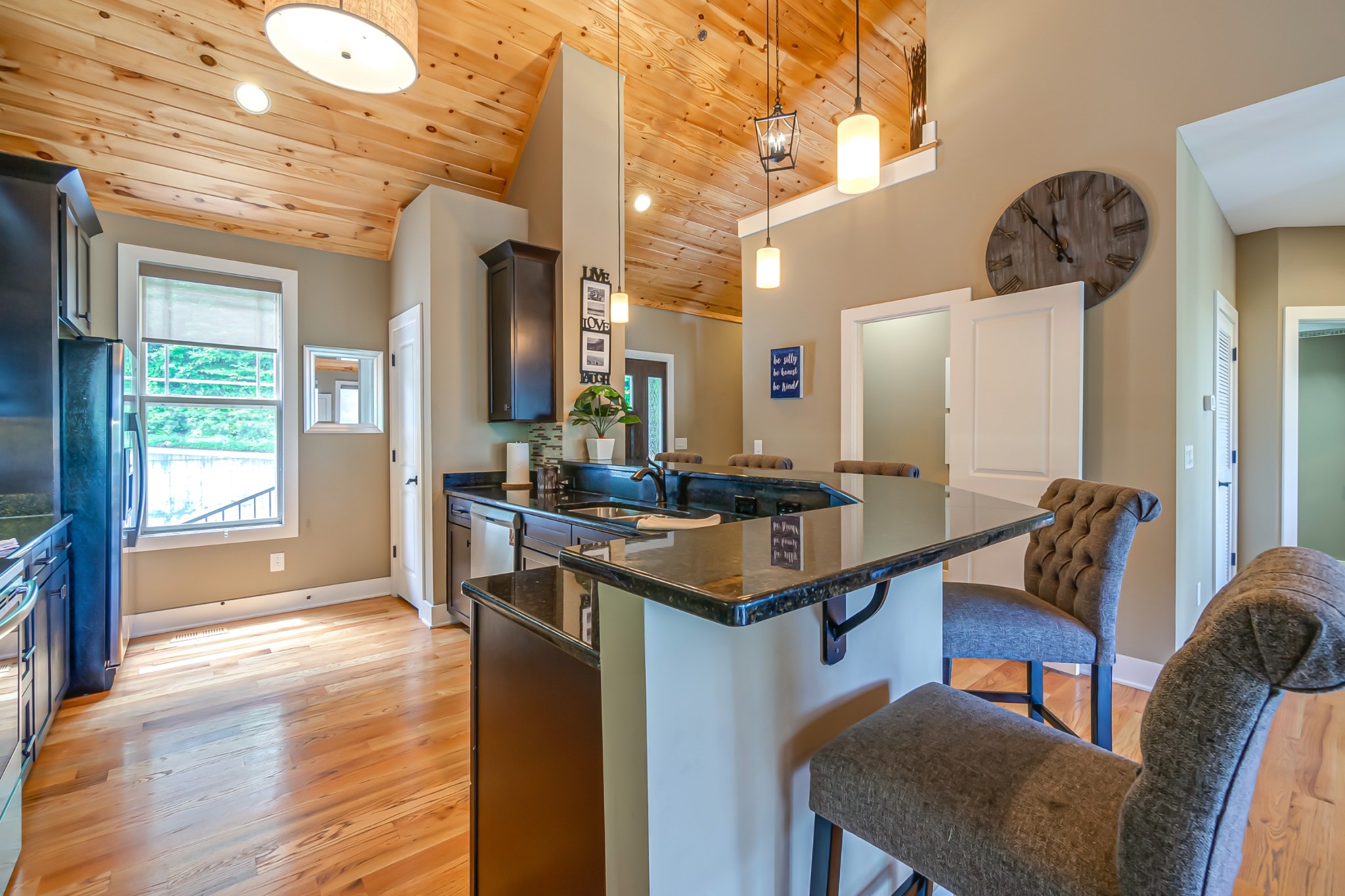 320 Floating Mill Road Silver Point, TN 38582 - Photo 11 of 41 a view of a kitchen area with furniture and wooden floor