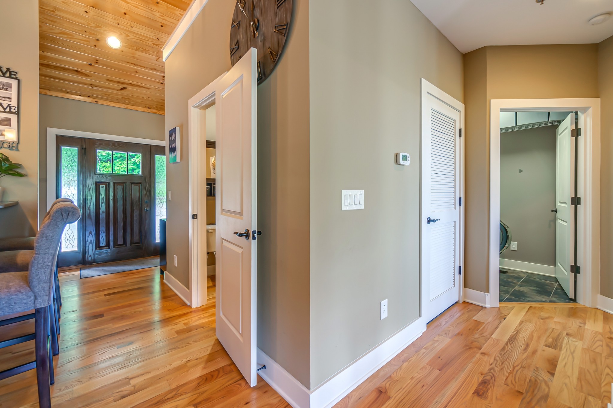320 Floating Mill Road Silver Point, TN 38582 - Photo 13 of 41 a view of a hallway with wooden floor and a bathroom