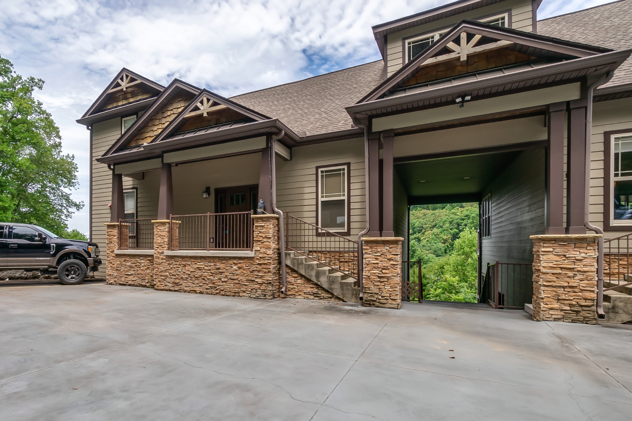 320 Floating Mill Road Silver Point, TN 38582 - Photo 3 of 40 front view of a house with a car parked in front of it