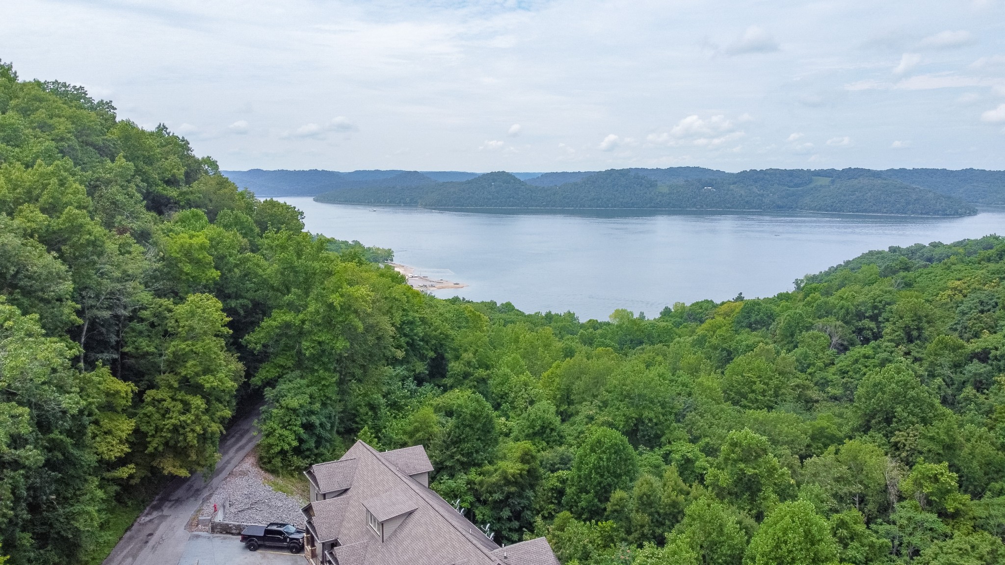 320 Floating Mill Road Silver Point, TN 38582 - Photo 40 of 40 an aerial view of a house with a lake view