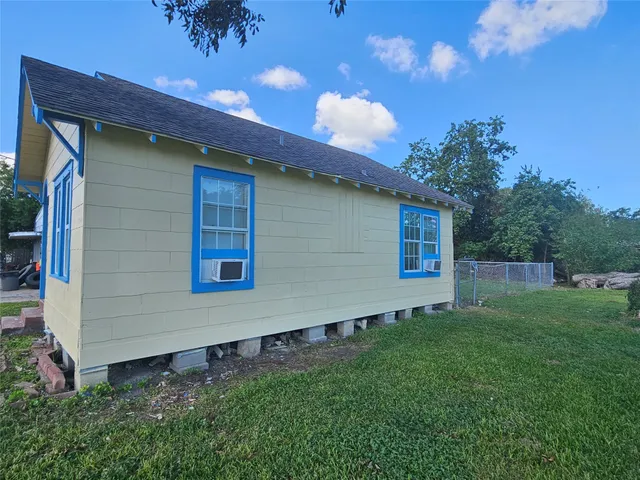 a backyard of a house with lots of green space