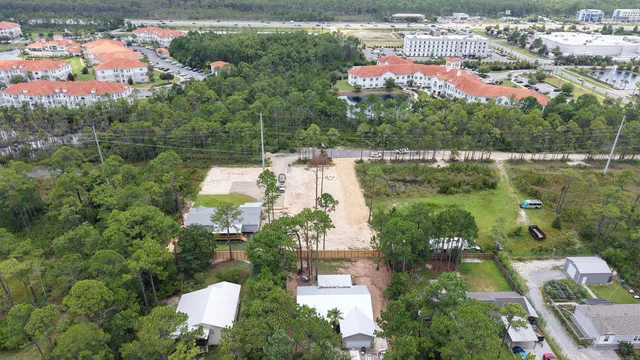an aerial view of house with yard