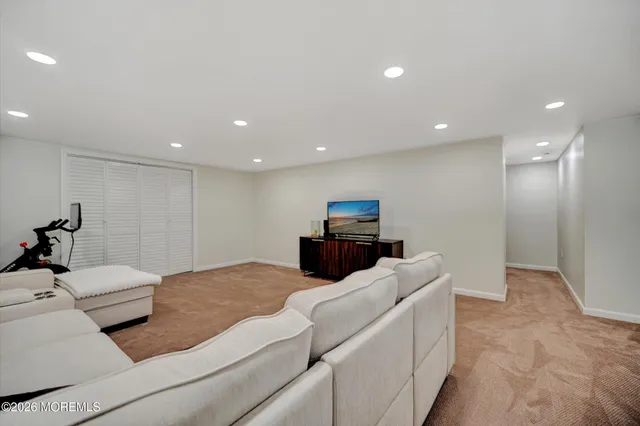 a living room with furniture and a television