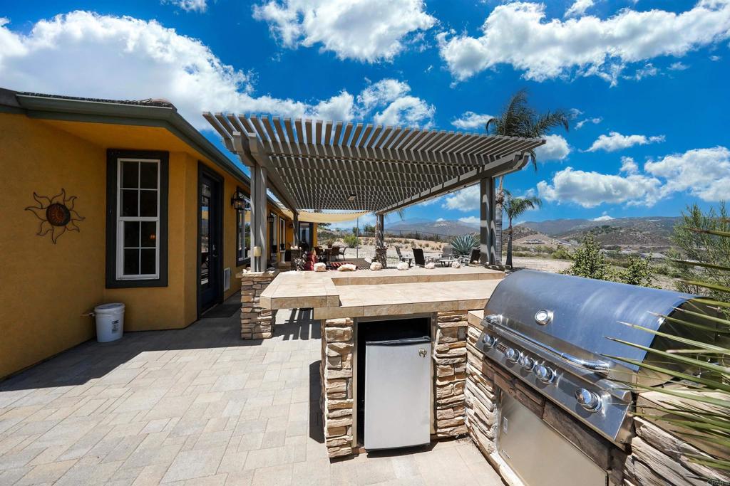 22963 Stokes Road Ramona, CA 92065 - Photo 12 of 57 a outdoor view with a sitting space