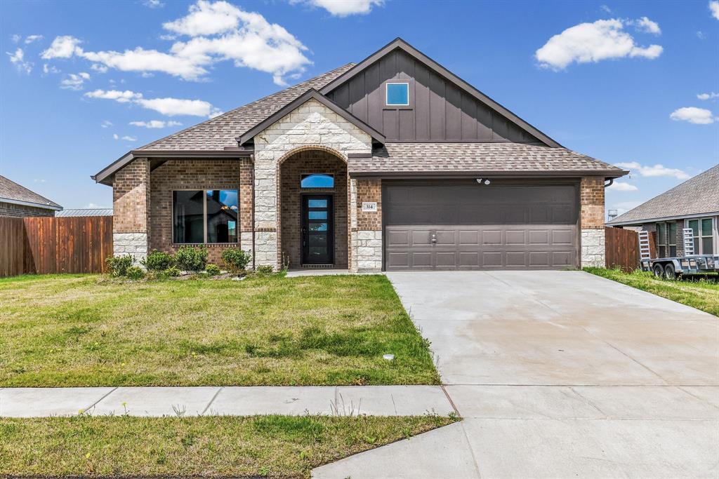 314 Pennington Road Josephine, TX 75173 - Photo 2 of 37 a front view of a house with garden