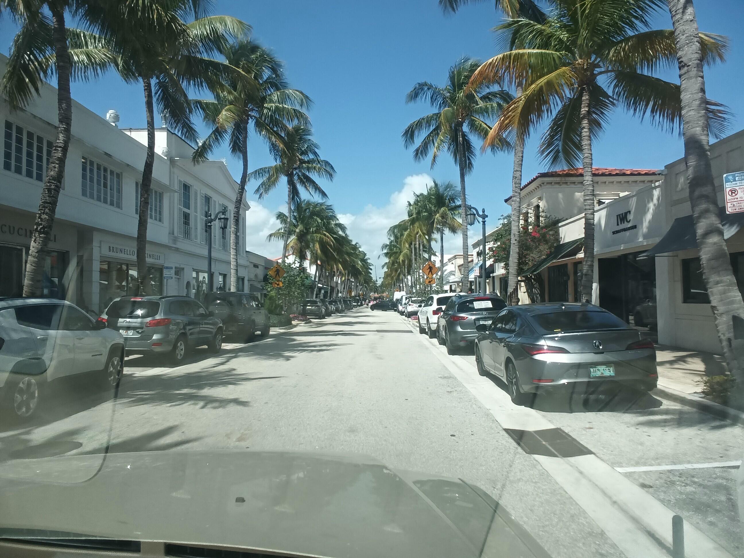 5200 North Flagler Drive, Unit 702 West Palm Beach, FL 33407 - Photo 14 of 36 a view of a street with a building in the background