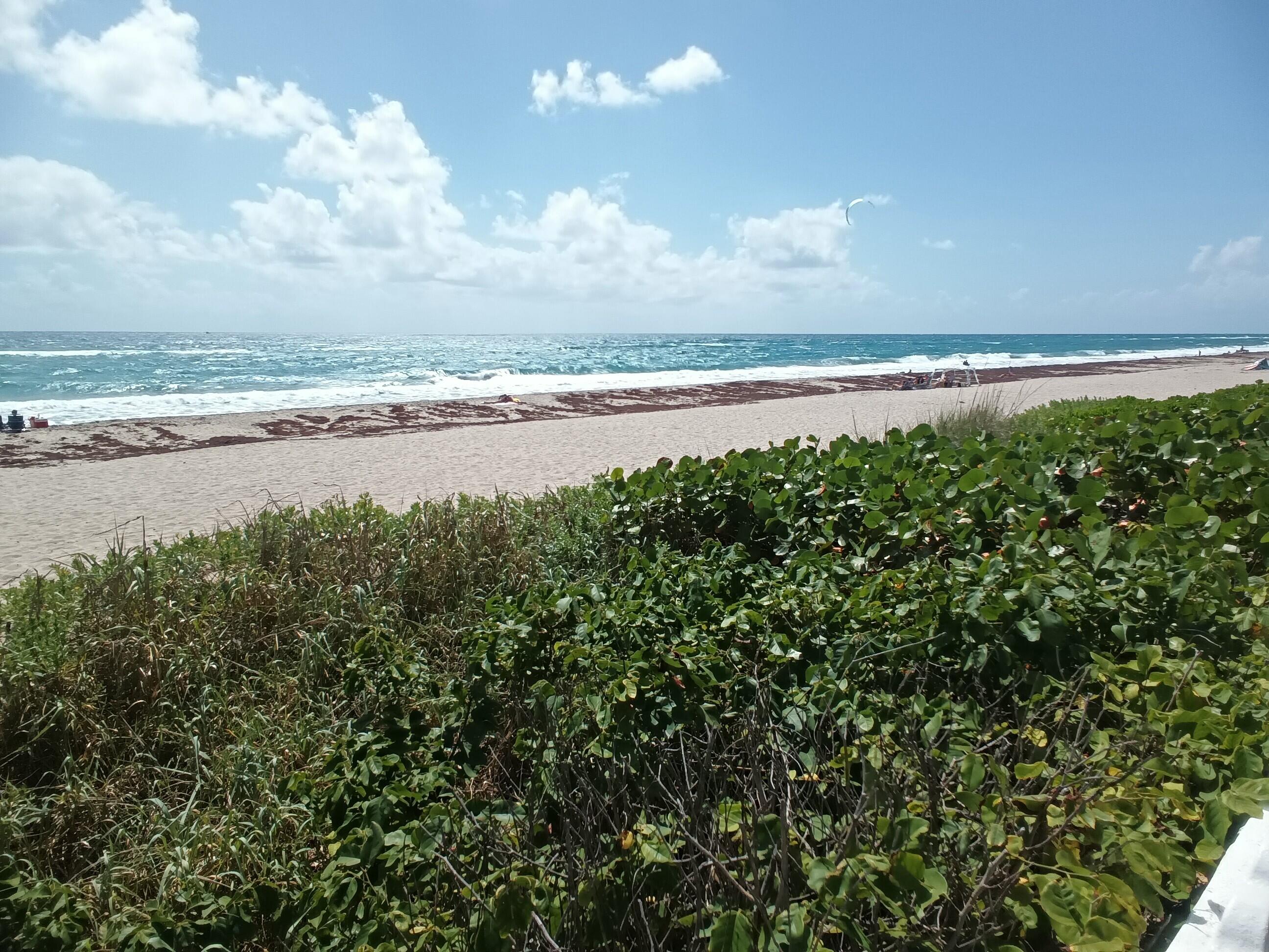 5200 North Flagler Drive, Unit 702 West Palm Beach, FL 33407 - Photo 15 of 36 a view of an ocean and beach