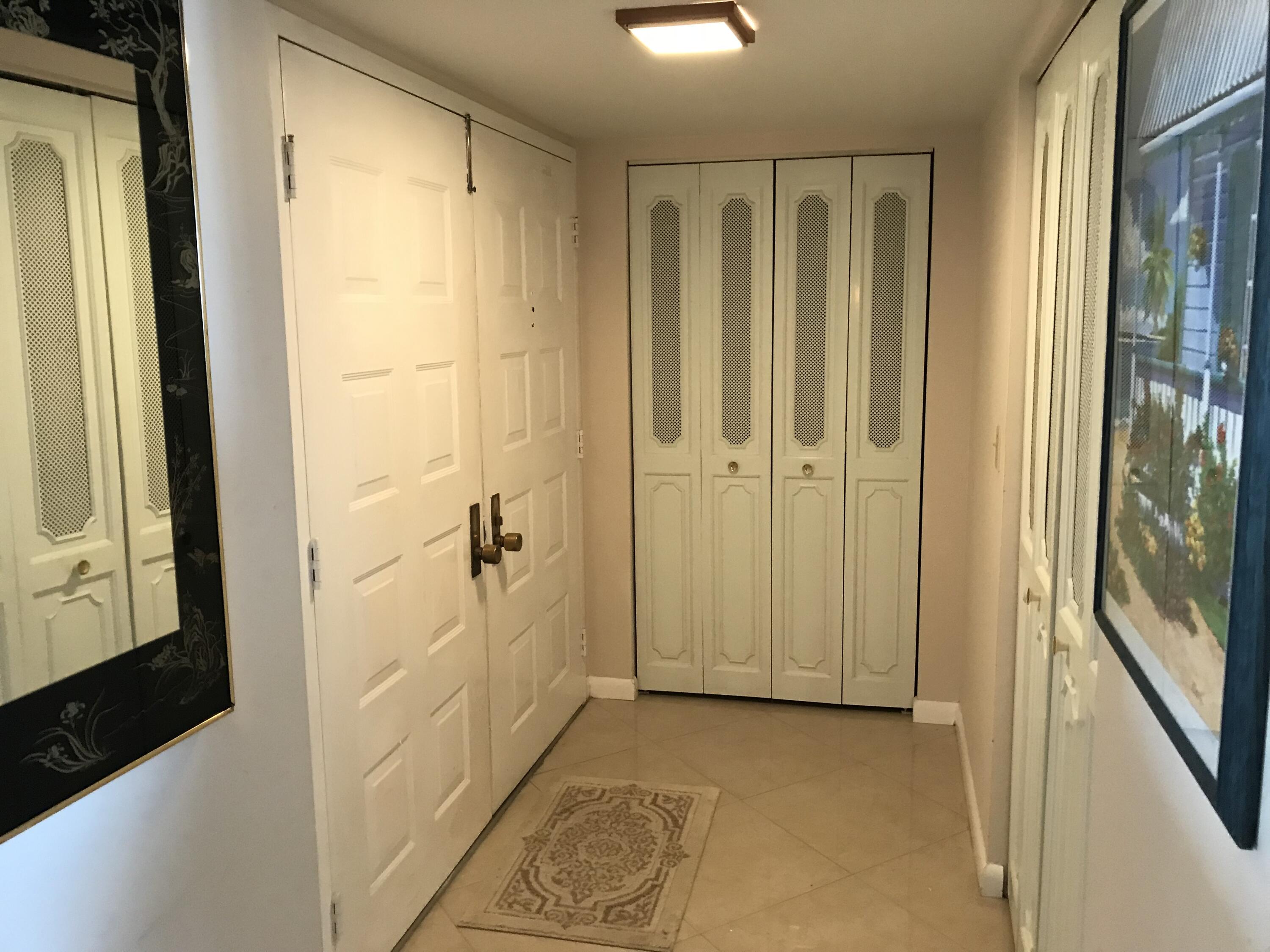 5200 North Flagler Drive, Unit 702 West Palm Beach, FL 33407 - Photo 31 of 36 a view of a bathroom with a shower