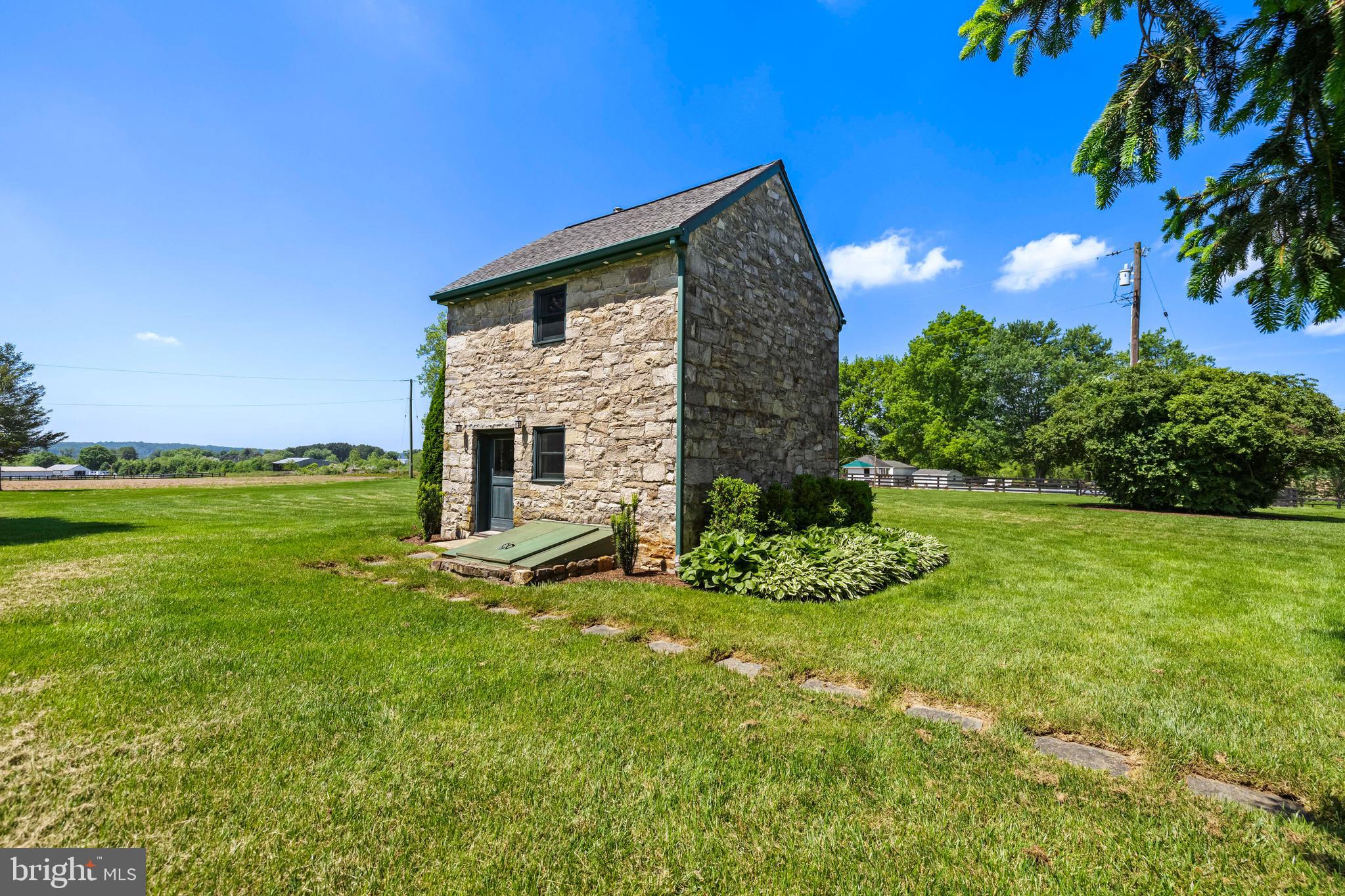 13128 Long Green Pike Baldwin, MD 21013 - Photo 101 of 124 a view of an house with backyard and garden
