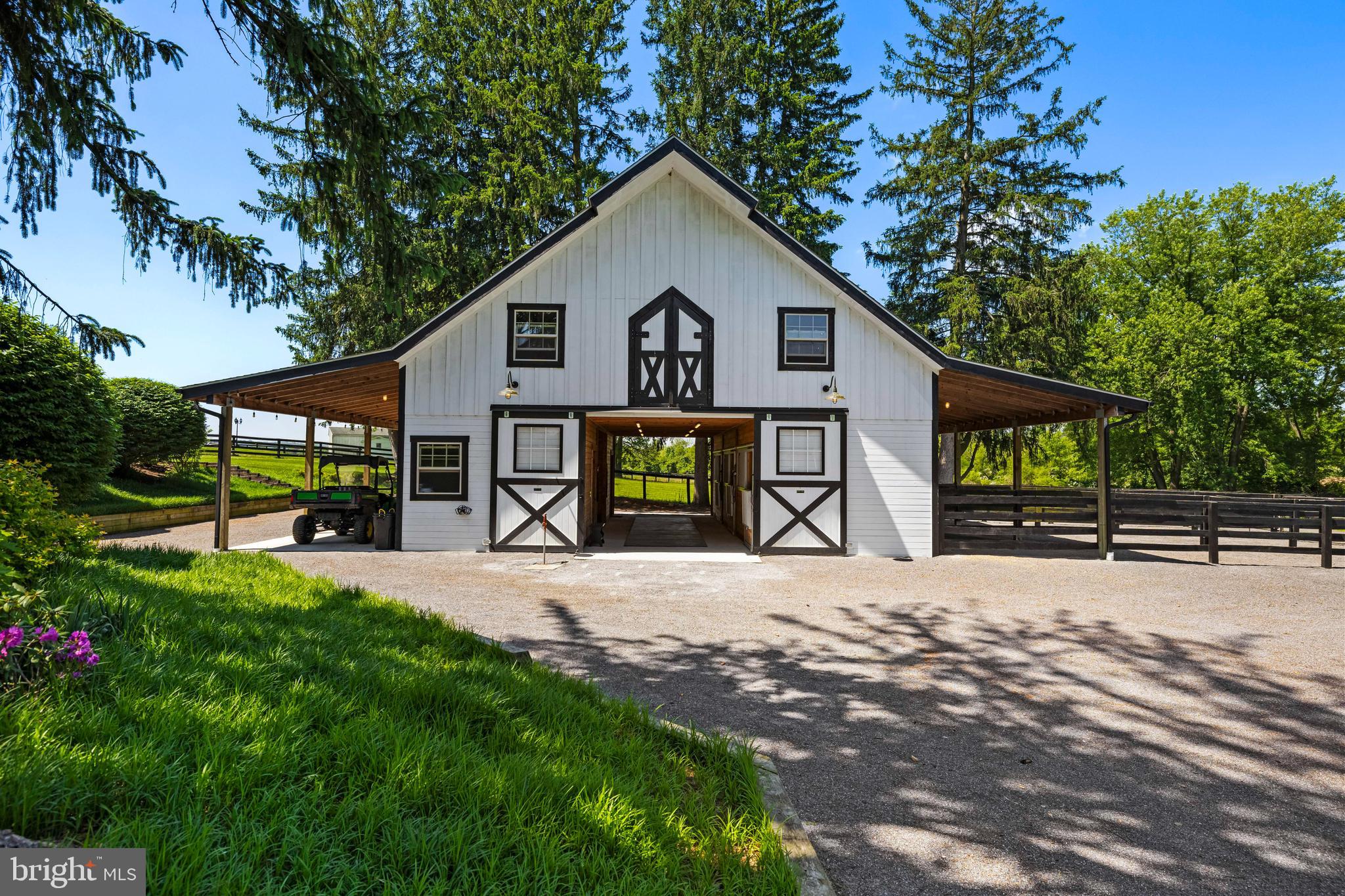 13128 Long Green Pike Baldwin, MD 21013 - Photo 103 of 124 a front view of a house with a yard and garage