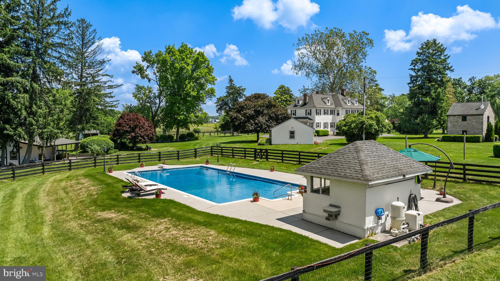 13128 Long Green Pike Baldwin, MD 21013 - Photo 116 of 124 a view of a swimming pool with a patio and a yard