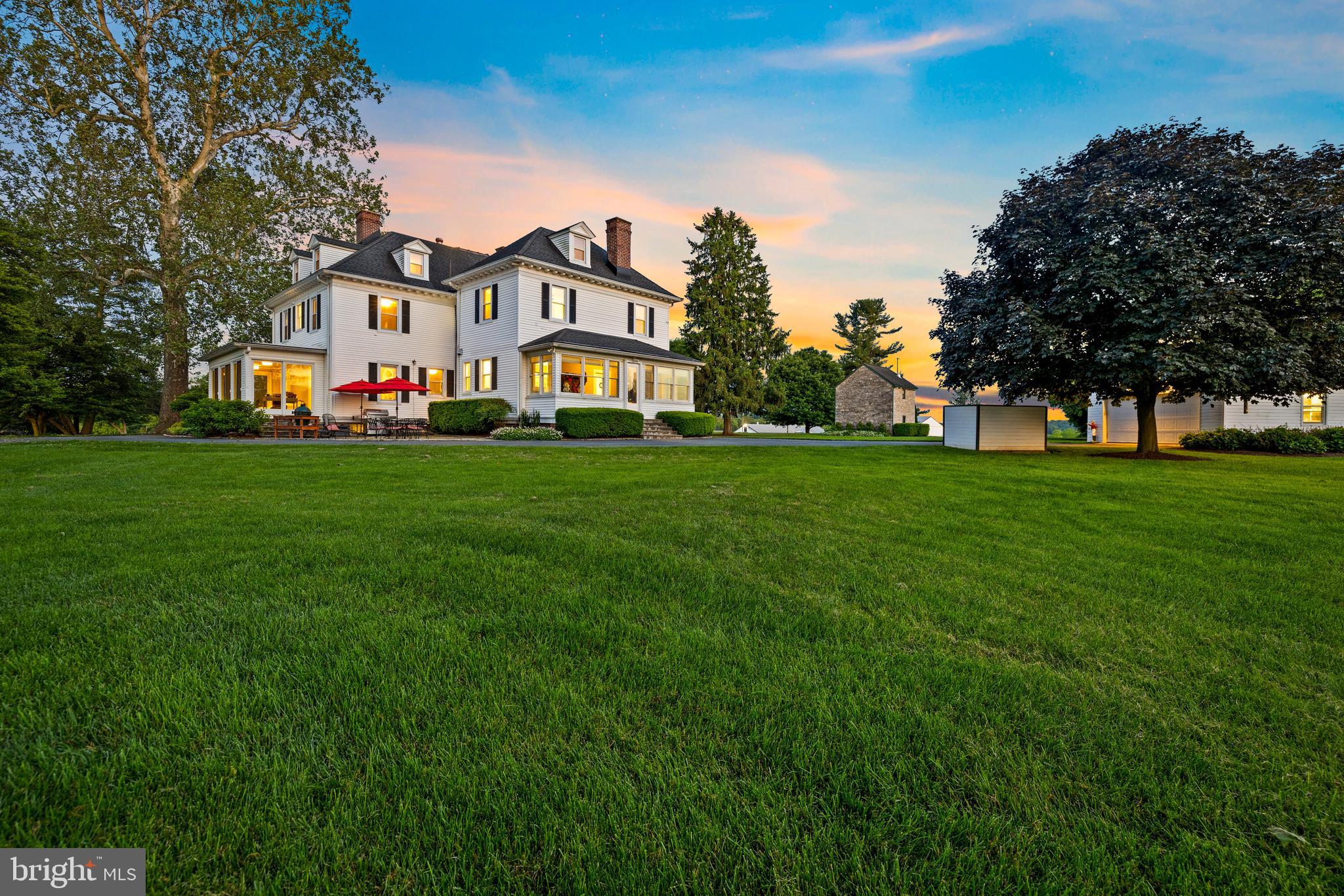 13128 Long Green Pike Baldwin, MD 21013 - Photo 117 of 124 a view of a big house with a big yard and large trees