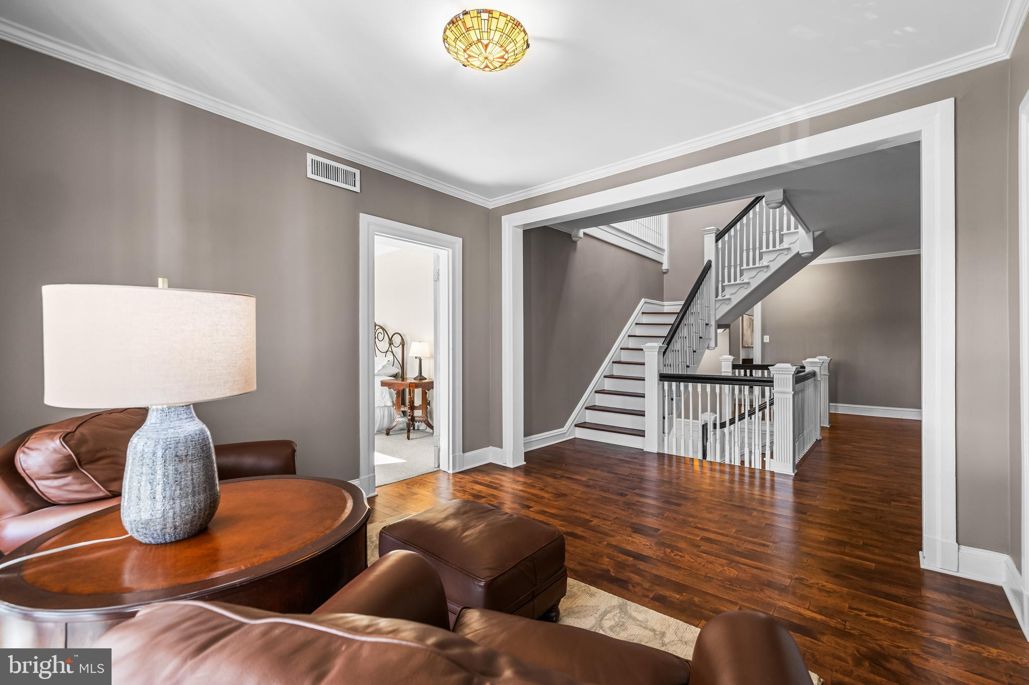 13128 Long Green Pike Baldwin, MD 21013 - Photo 54 of 124 a living room with furniture and wooden floor