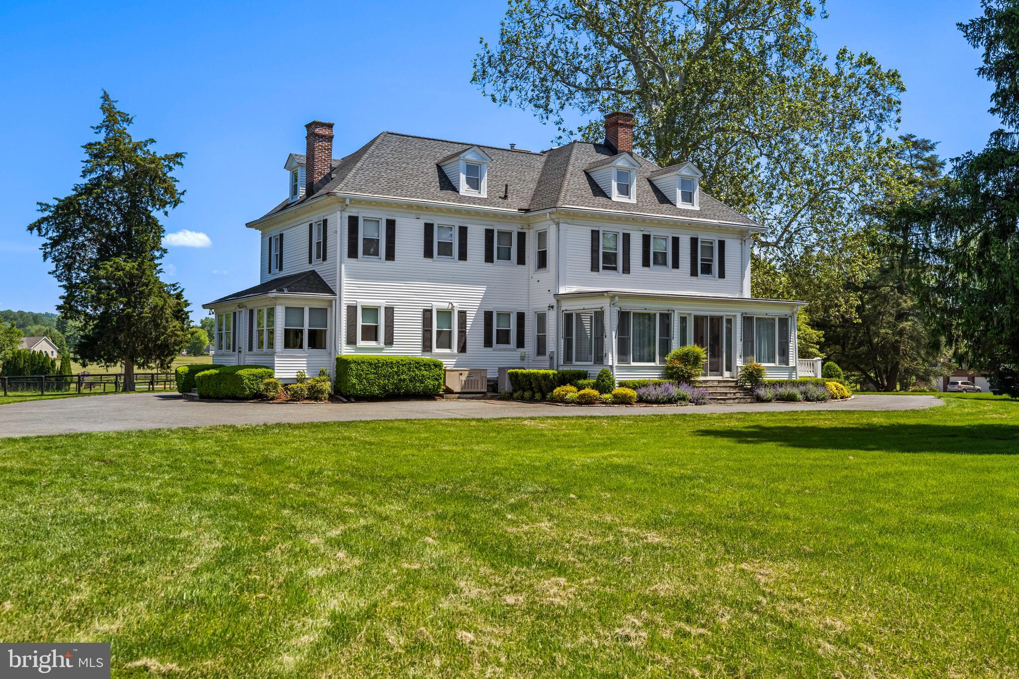 13128 Long Green Pike Baldwin, MD 21013 - Photo 99 of 124 a front view of a house with swimming pool having outdoor seating