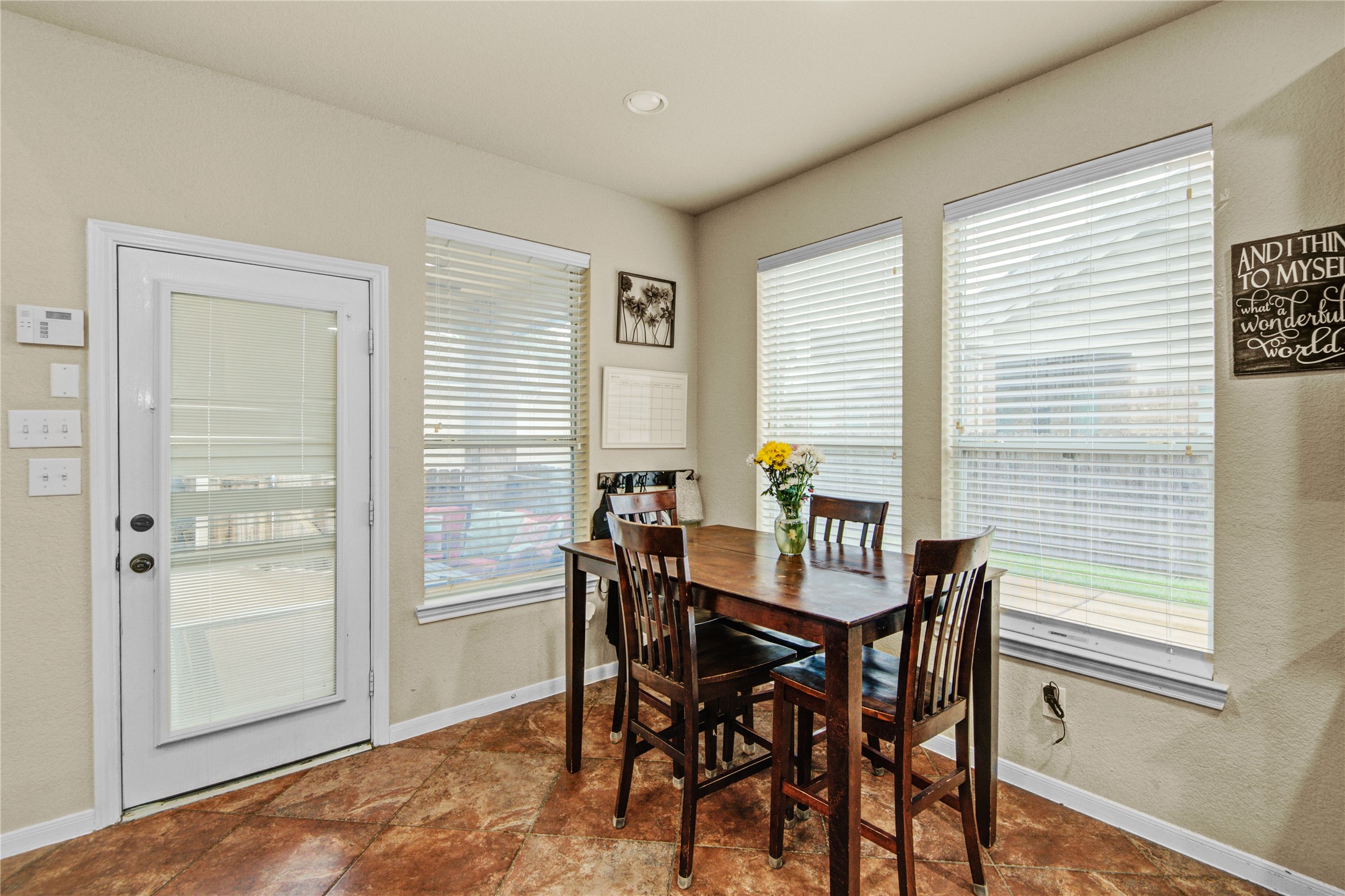 6007 Valhalla Drive Spring, TX 77379 - Photo 13 of 37 Bathed in natural light, the breakfast area offers a cozy space for morning coffee and everyday meals overlooking the backyard.