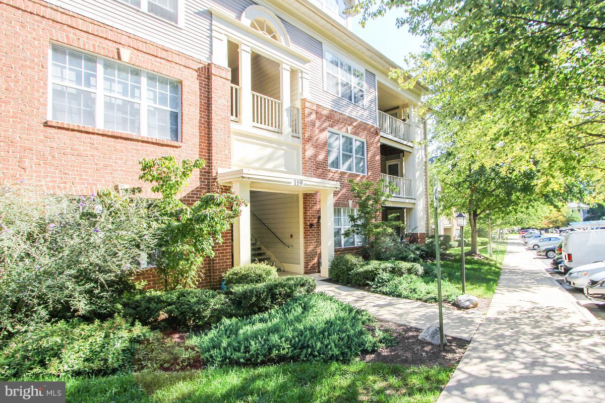 119 Timberbrook Lane, Unit 101 Gaithersburg, MD 20878 - Photo 2 of 29 a view of a building with a street