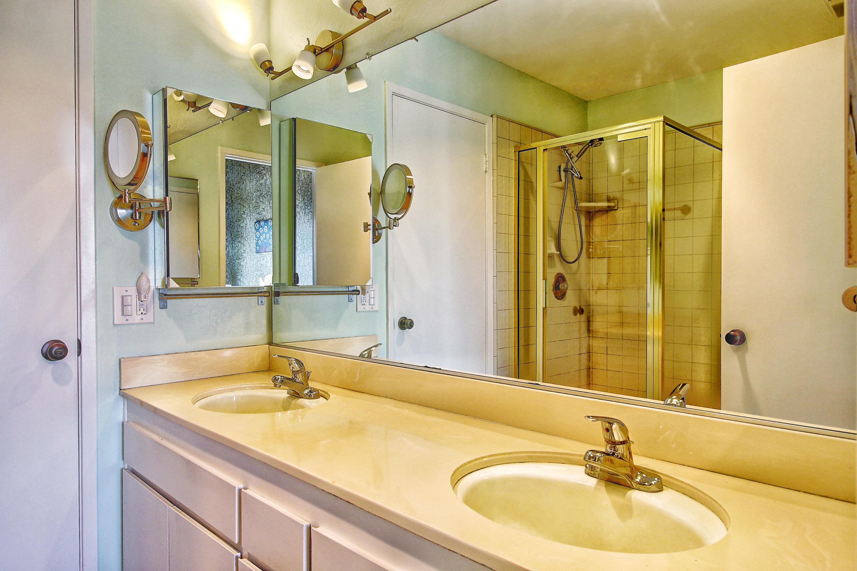 51 North San Marcos Road, Unit B Santa Barbara, CA 93111 - Photo 13 of 24 a bathroom with a sink and a mirror