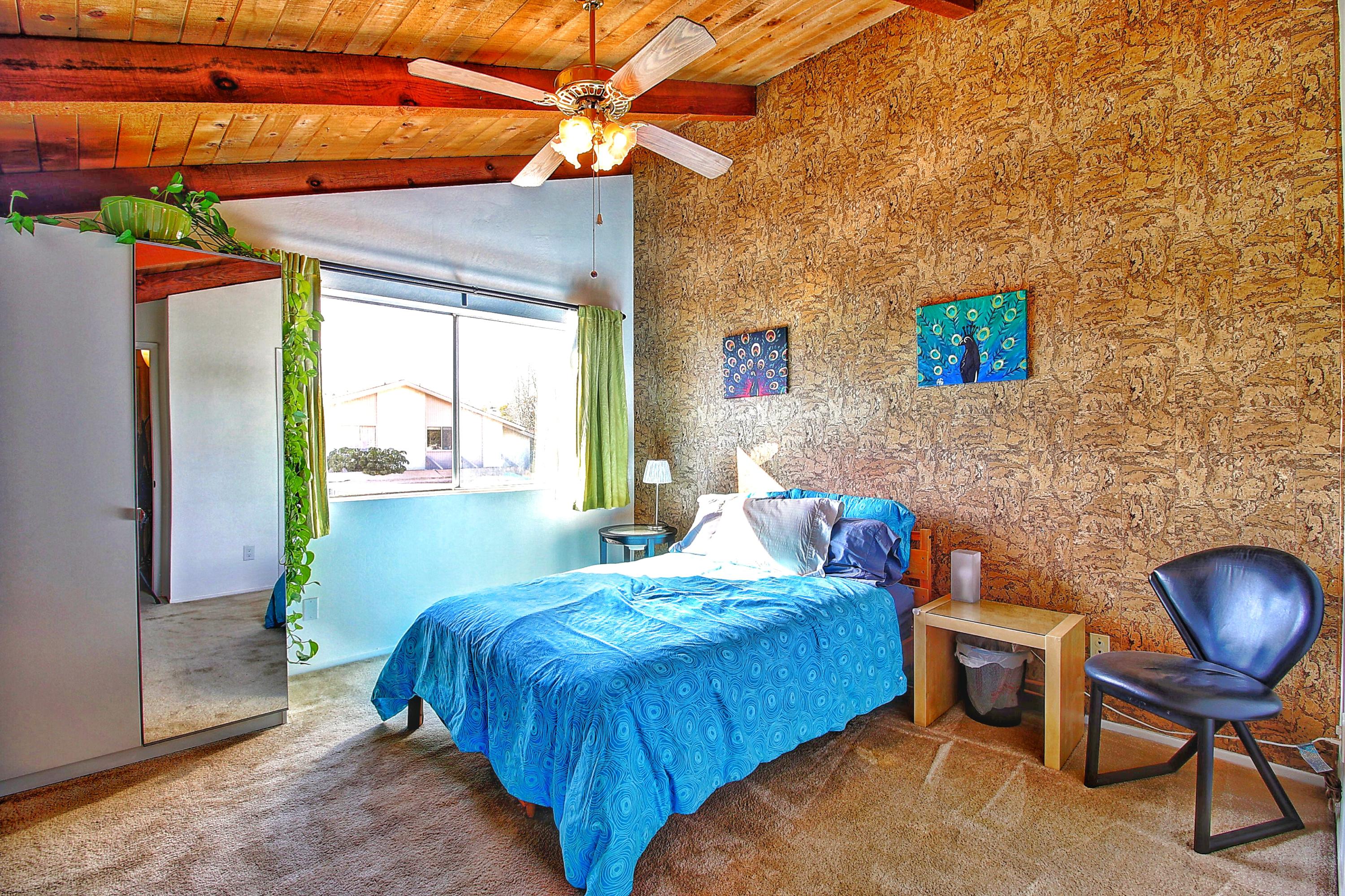 51 North San Marcos Road, Unit B Santa Barbara, CA 93111 - Photo 14 of 24 a bedroom with a bed chair and a window