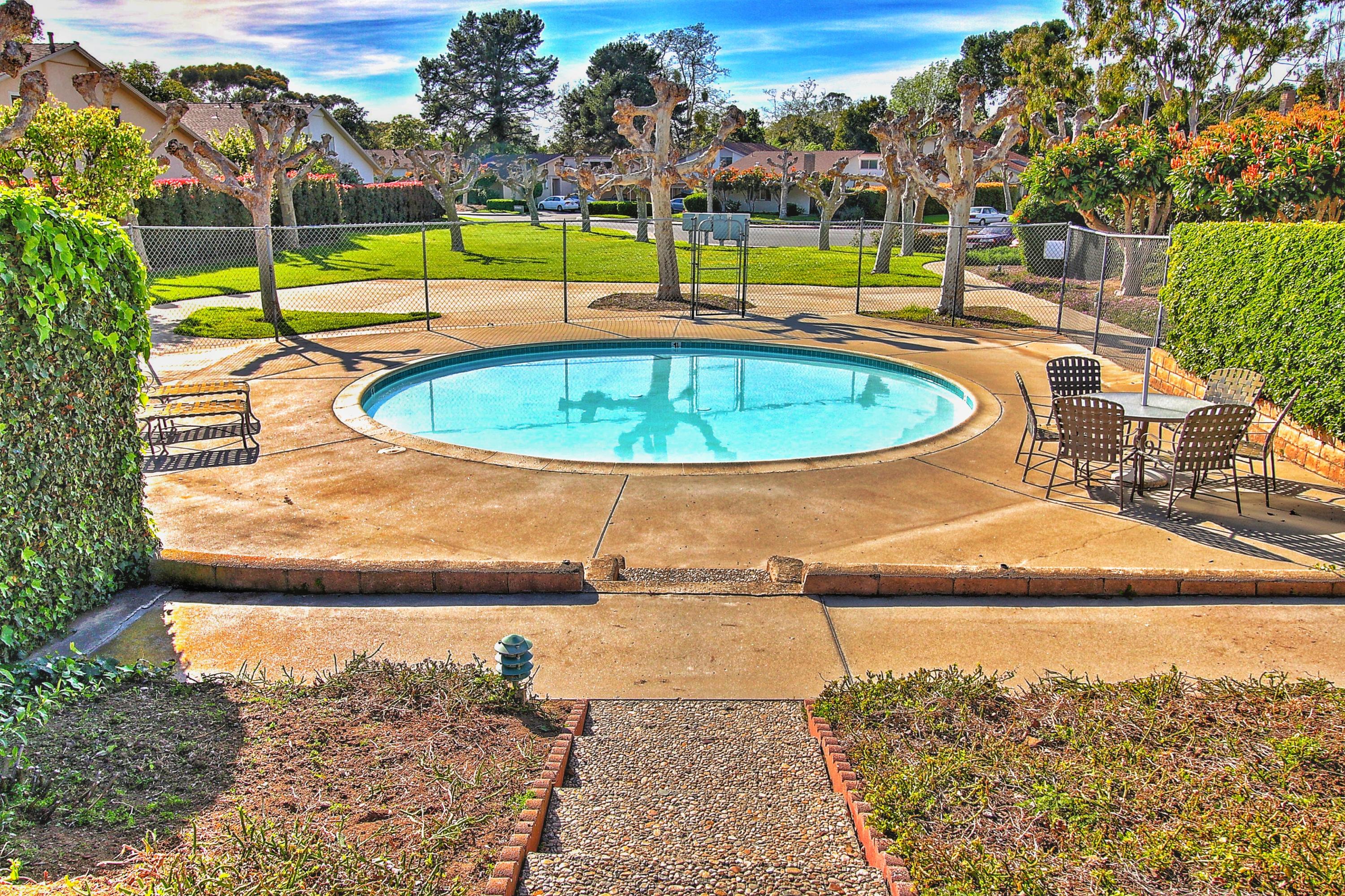 51 North San Marcos Road, Unit B Santa Barbara, CA 93111 - Photo 21 of 24 a view of a swimming pool with an outdoor space and seating area