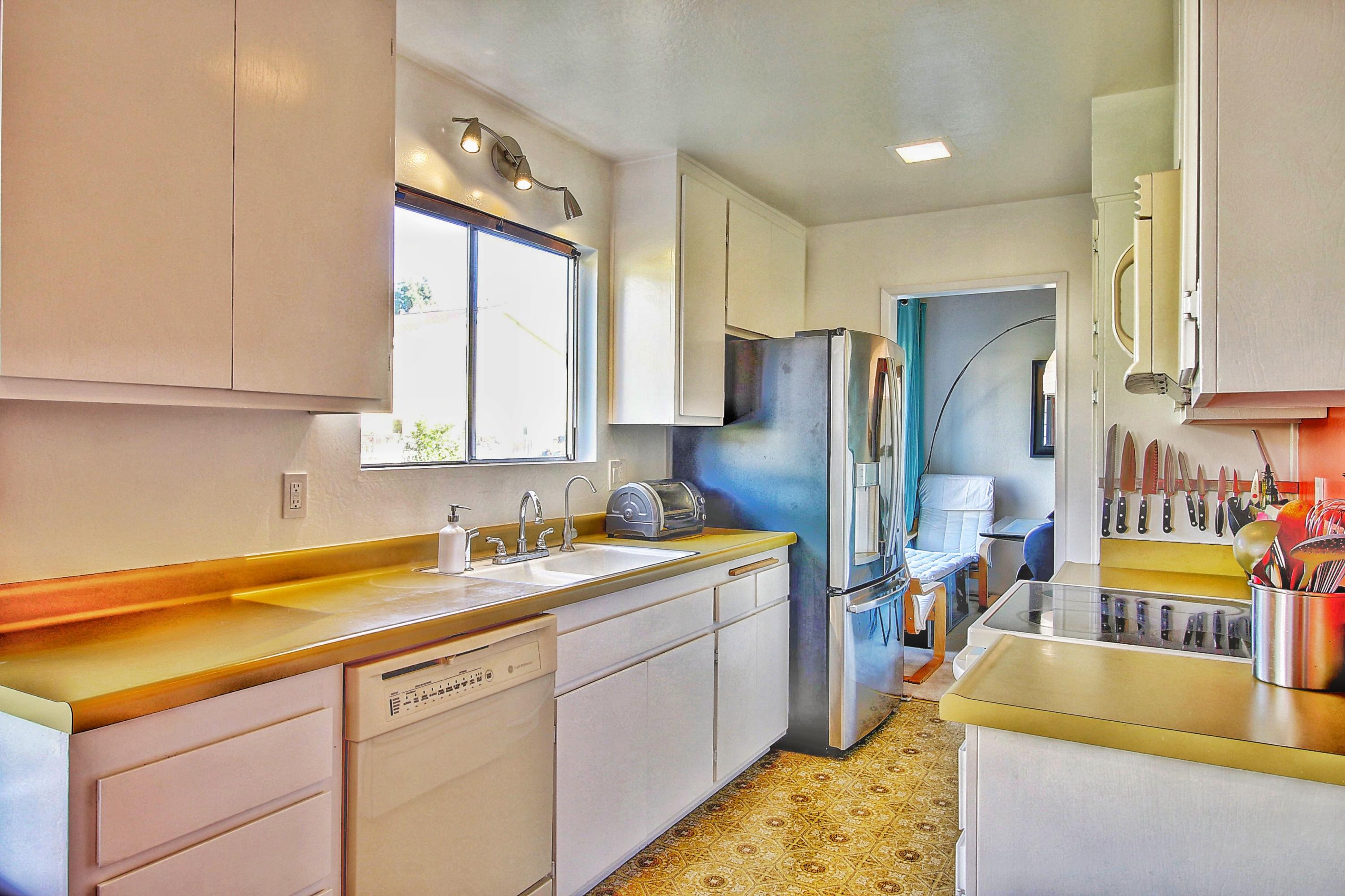 51 North San Marcos Road, Unit B Santa Barbara, CA 93111 - Photo 7 of 24 a kitchen with a sink appliances and cabinets