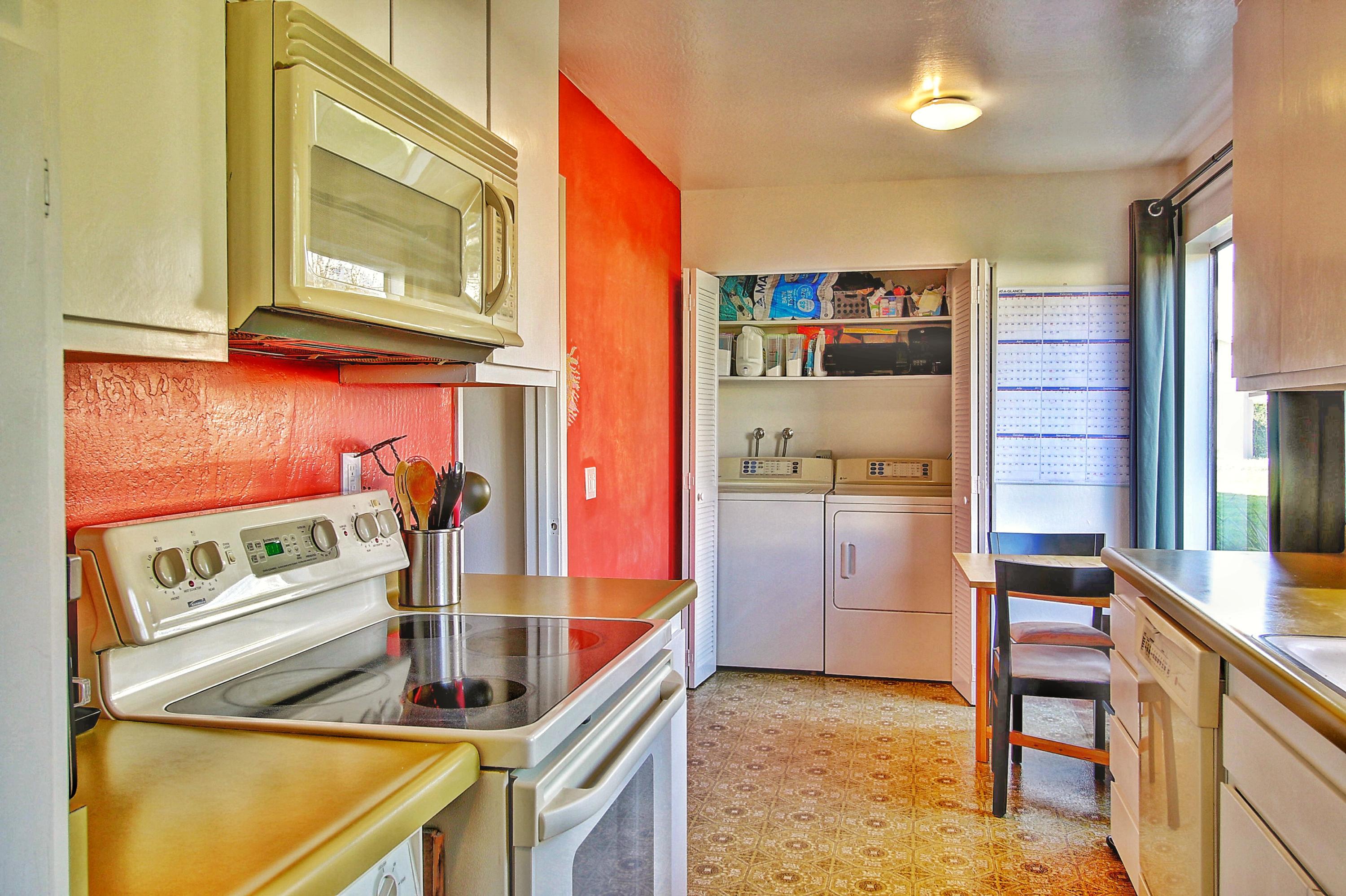 51 North San Marcos Road, Unit B Santa Barbara, CA 93111 - Photo 9 of 24 a kitchen that has a stove and a microwave