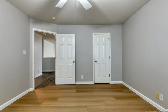 a view of backyard with small cabin