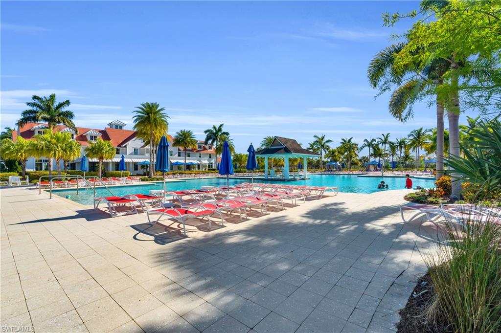 8937 Calypso Court Naples, FL 34113 - Photo 30 of 43 a view of outdoor space with garden view