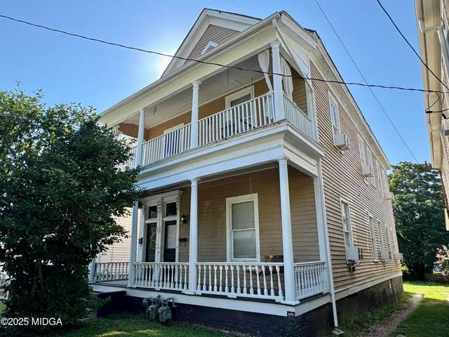 a view of a house with a deck