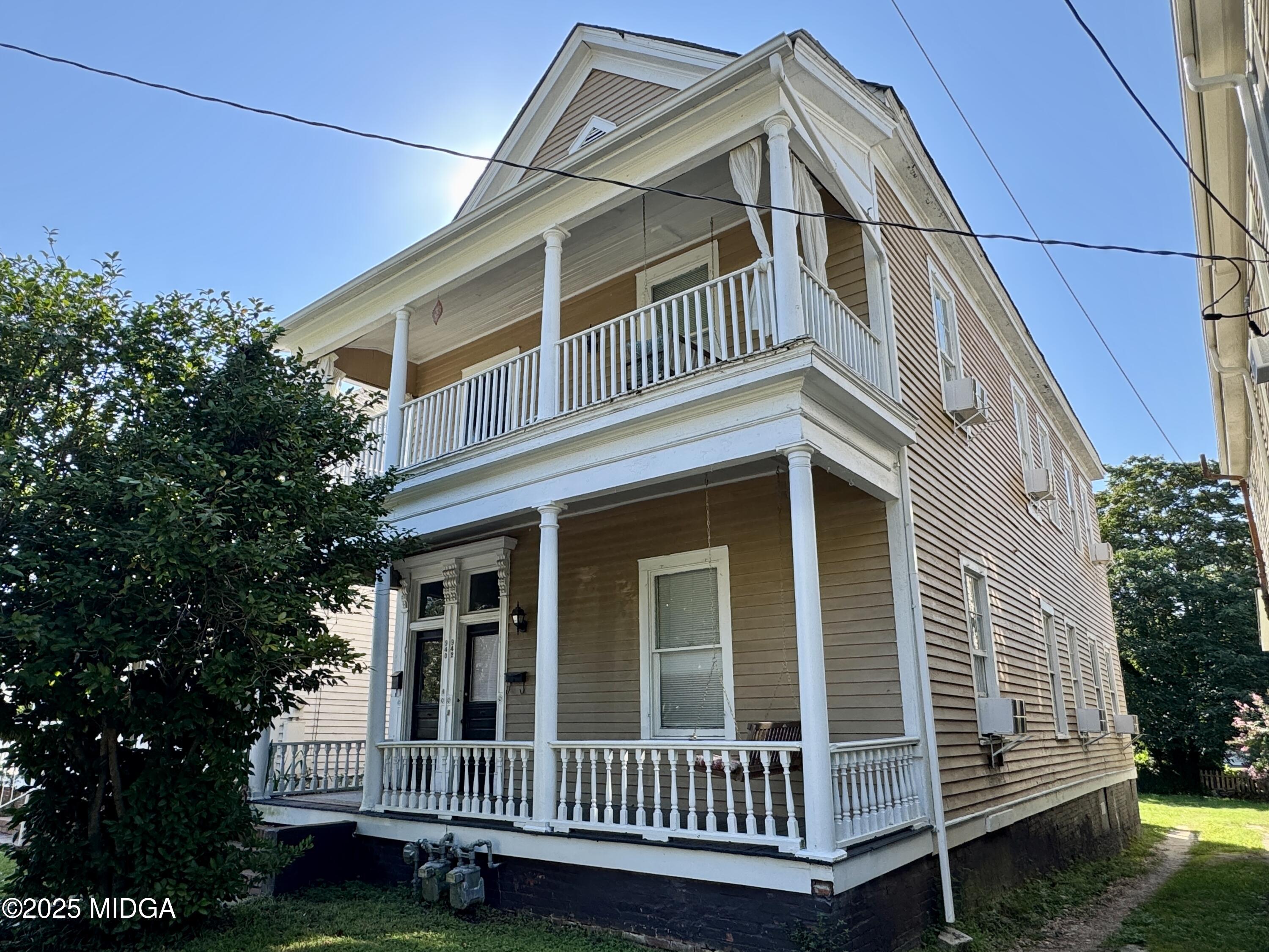 a view of a house with a deck