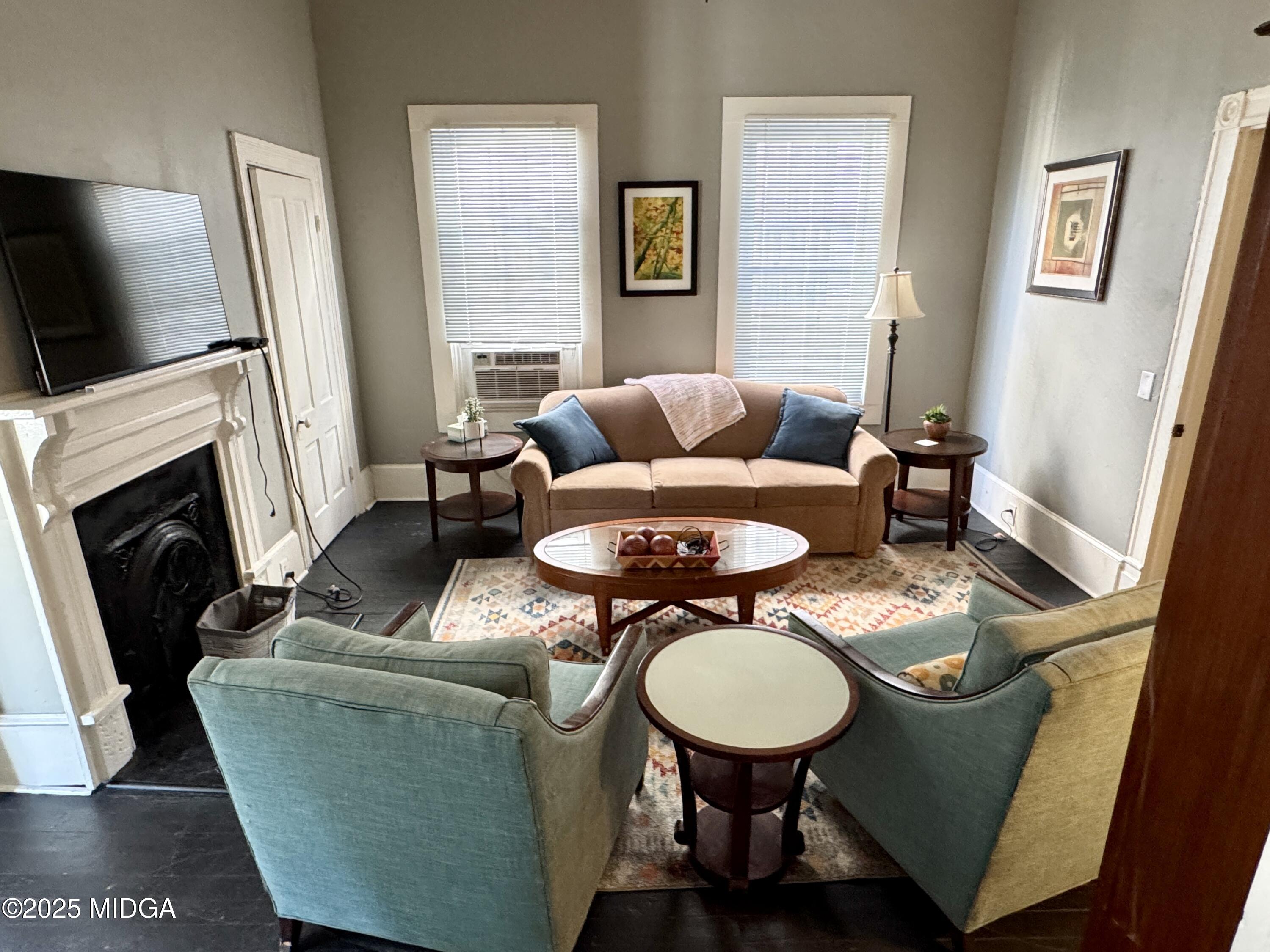 940 Cole Street Macon, GA 31201 - Photo 5 of 22 a living room with furniture and a fireplace