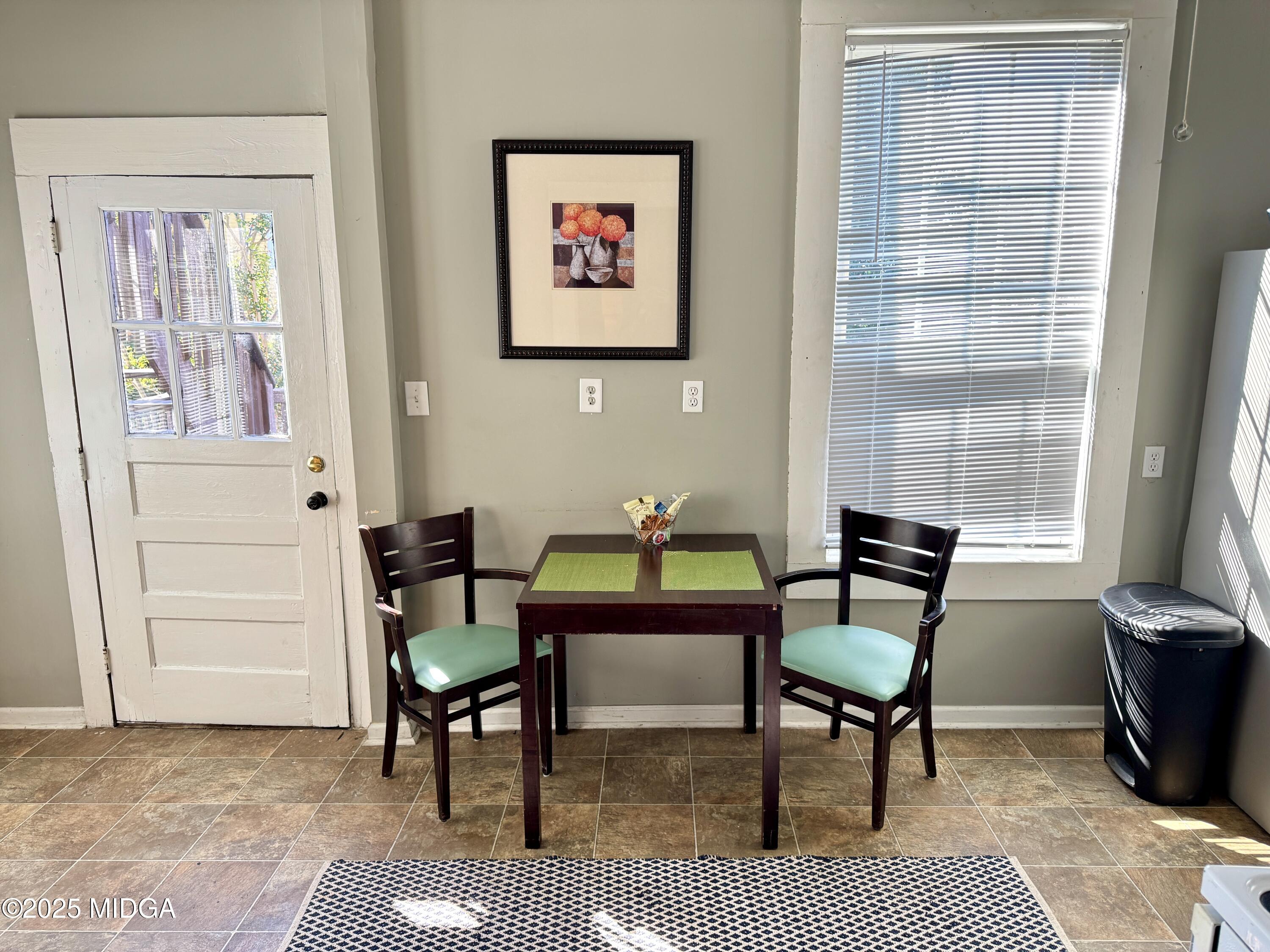 940 Cole Street Macon, GA 31201 - Photo 6 of 22 a outdoor dining space with furniture and window