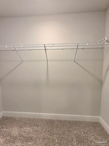 a view of small space with racks on the wall