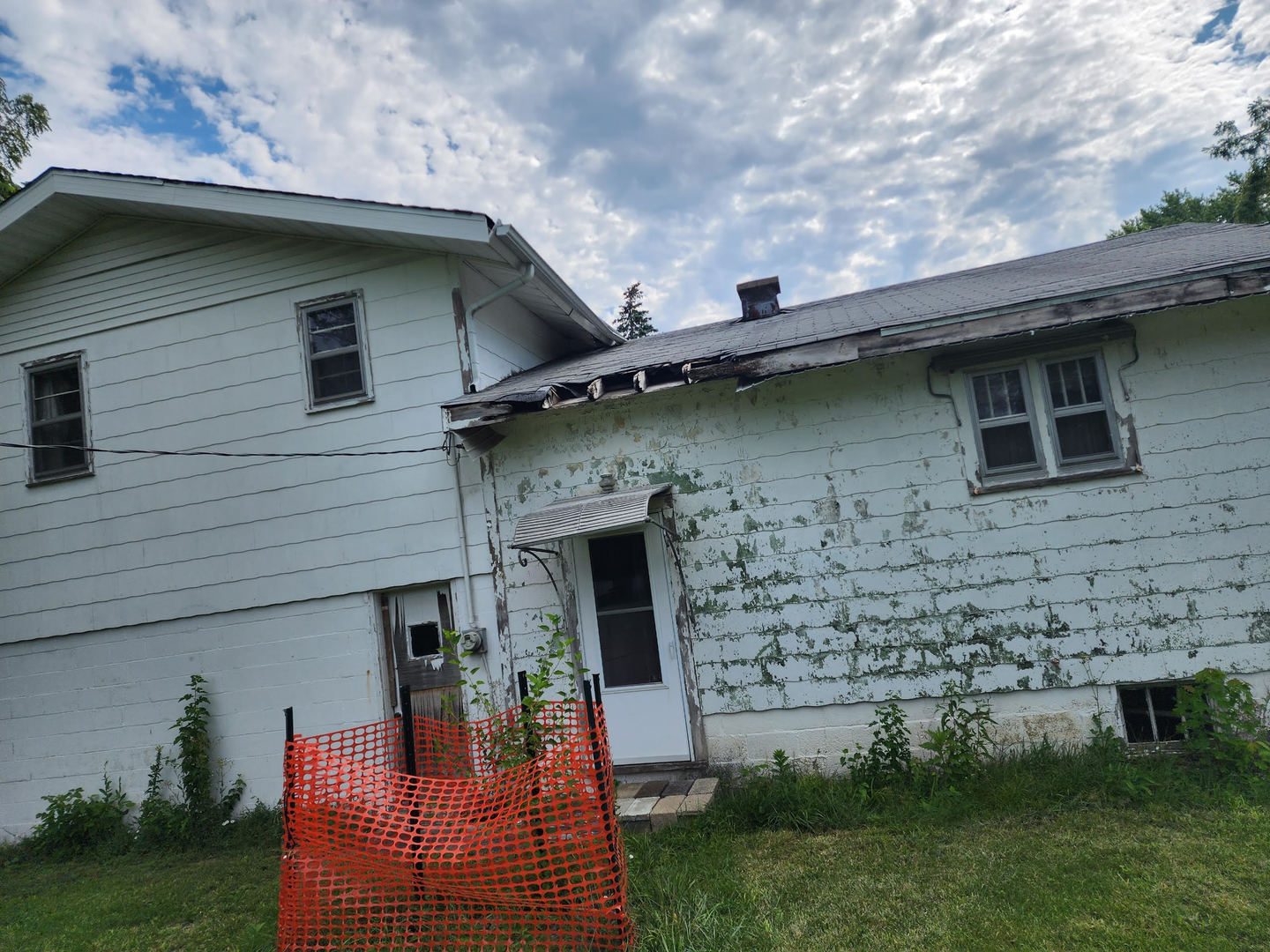 6S363 4th Street Eola, IL 60519 - Photo 3 of 18 a front view of a house with garden