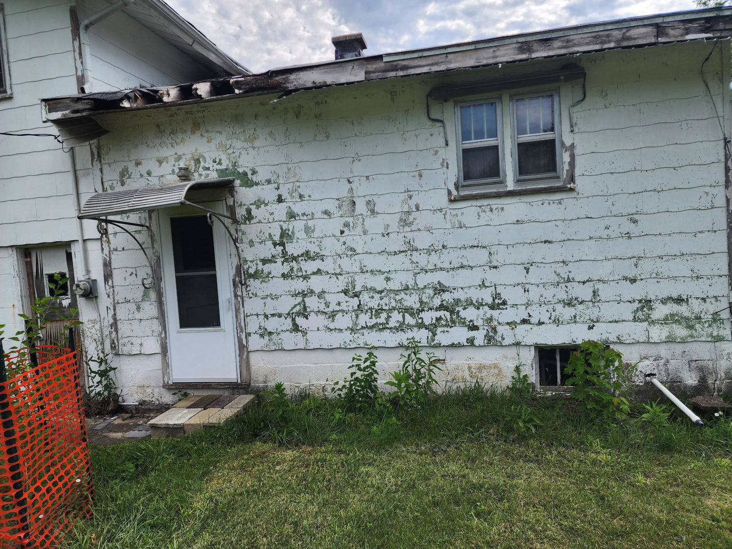 6S363 4th Street Eola, IL 60519 - Photo 4 of 18 a front view of a house with garden