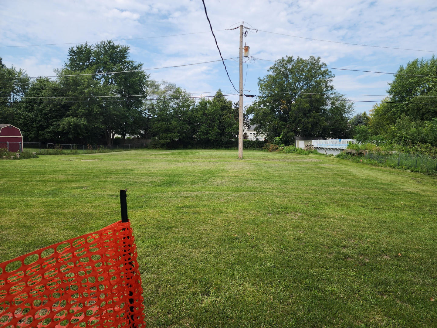 6S363 4th Street Eola, IL 60519 - Photo 7 of 18 a view of a golf course with a lake