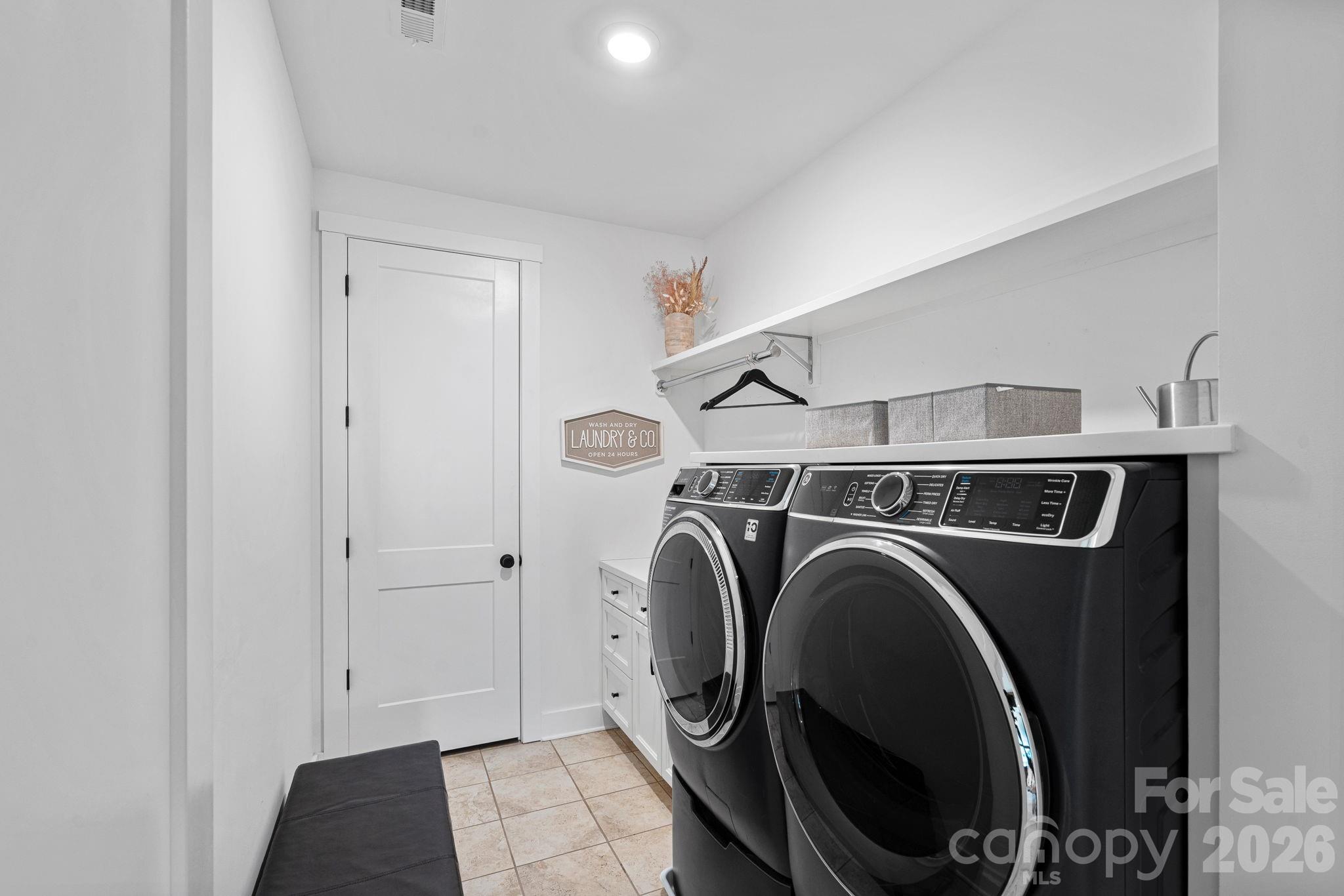 18401 Doves Crest Road Cornelius, NC 28031 - Photo 30 of 39 a utility room with dryer and washer