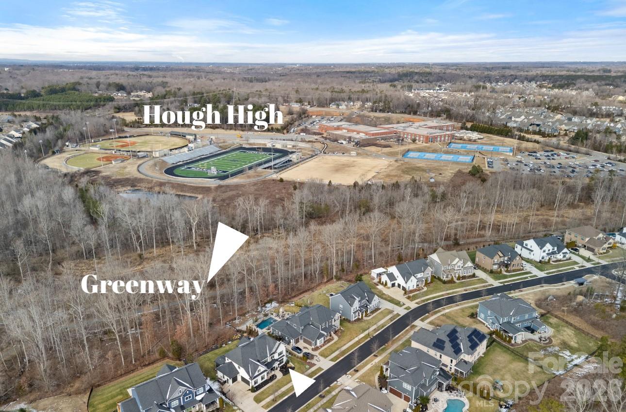 18401 Doves Crest Road Cornelius, NC 28031 - Photo 39 of 39 an aerial view of a house with a ocean view