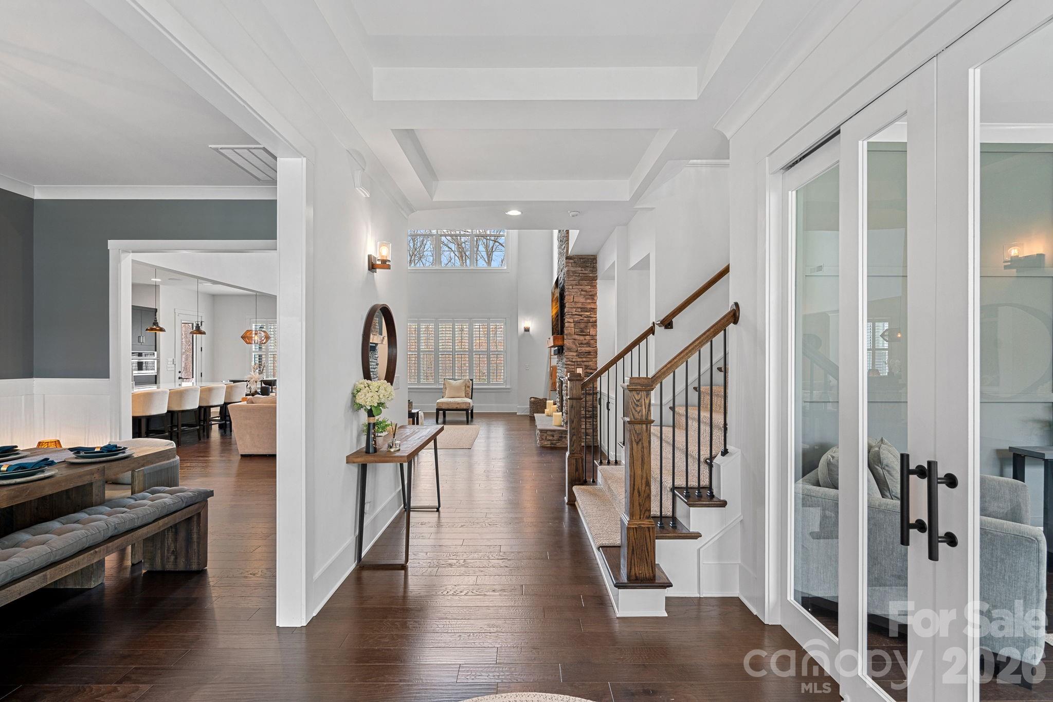 18401 Doves Crest Road Cornelius, NC 28031 - Photo 5 of 39 a view of a living room and dining room