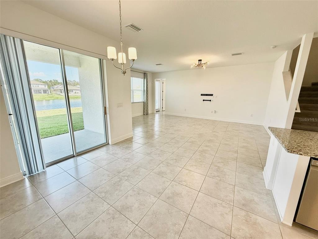 12189 Nouveau Avenue Spring Hill, FL 34610 - Photo 16 of 50 a view of an empty room with a window