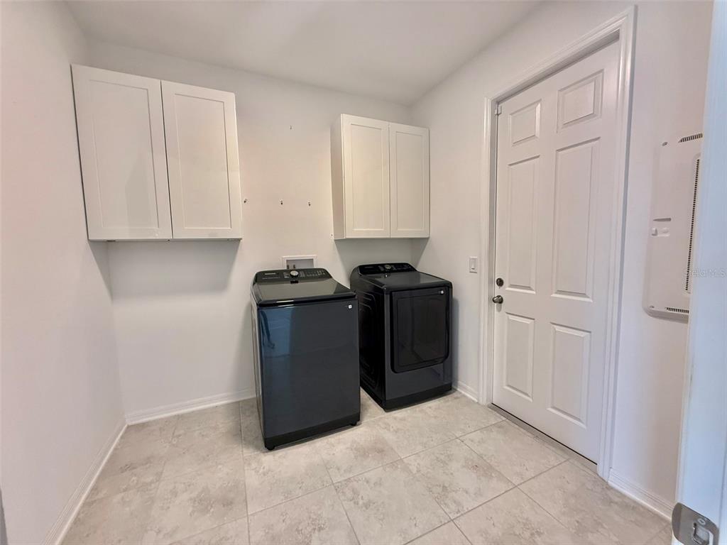 12189 Nouveau Avenue Spring Hill, FL 34610 - Photo 42 of 50 a view of a storage & utility room