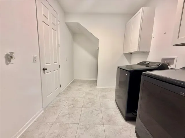 a house view with swimming pool in front of it