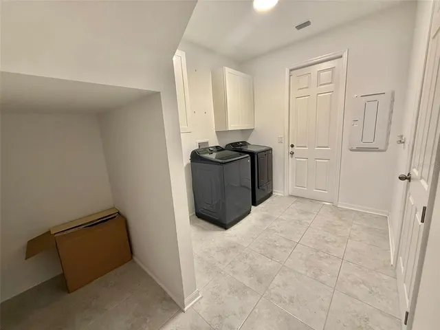 a swimming pool with outdoor seating and yard