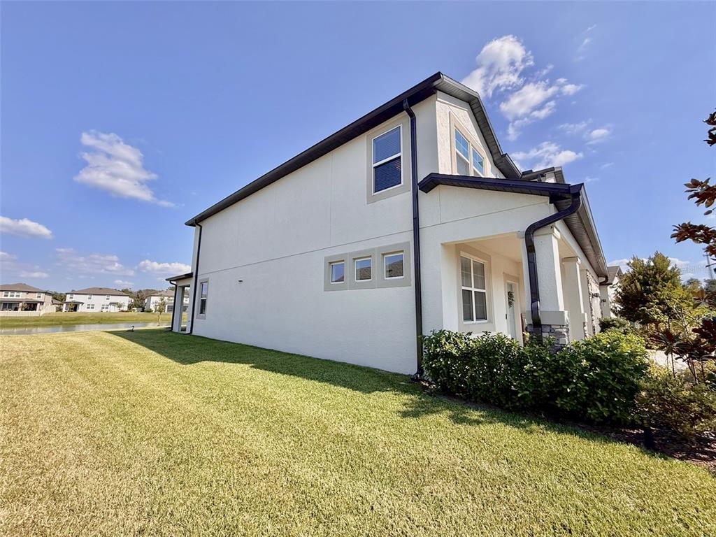 12189 Nouveau Avenue Spring Hill, FL 34610 - Photo 47 of 50 a view of a house with a backyard