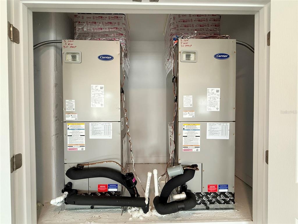 12189 Nouveau Avenue Spring Hill, FL 34610 - Photo 50 of 50 a view of a car garage door