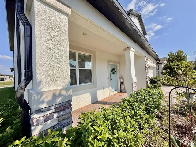 a house view with a outdoor space