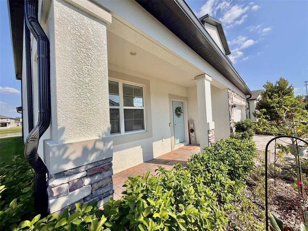 12189 Nouveau Avenue Spring Hill, FL 34610 - Photo 8 of 50 a house view with a outdoor space